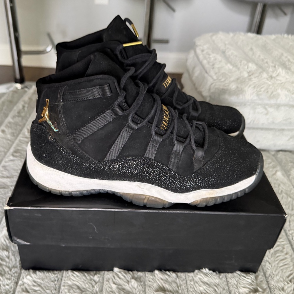 Jordan Retro 11s Black and Gold Sneakers